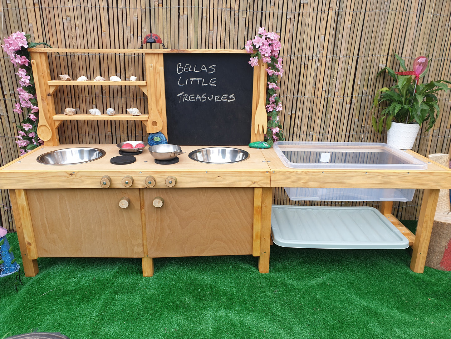 Large mud kitchen with blackboard and water / sand table