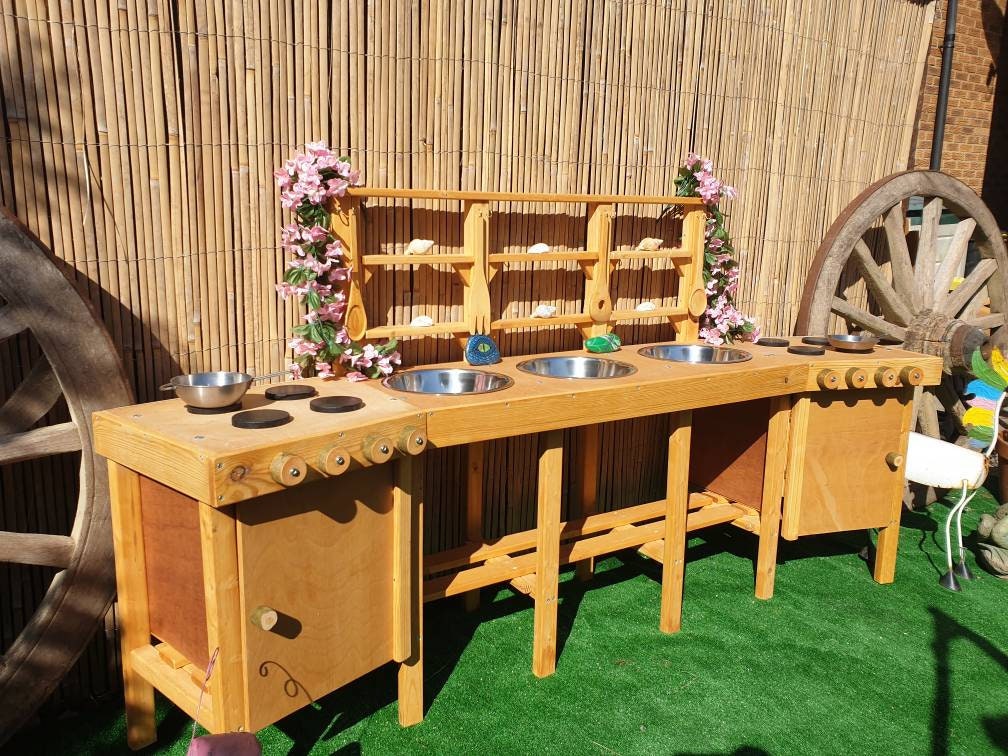 XXL Mud kitchen with 3 bowls, 2 ovens, and 8 utensil hooks.